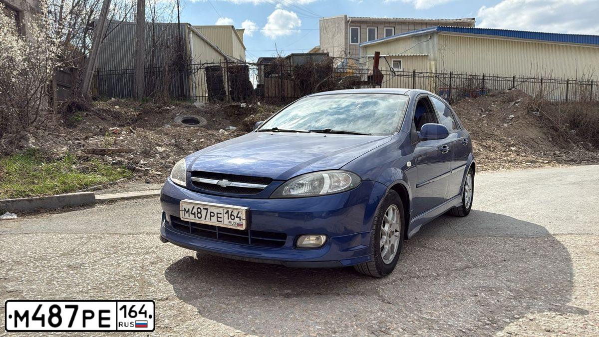 Фото автомобиля CHEVROLET LACETTI, 2008 — госномер В021ХО64. Цвет: синий