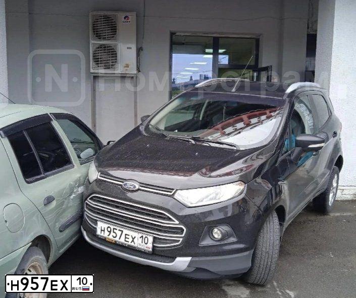 Фото автомобиля FORD ECOSPORT, 2014 — госномер Н957ЕХ10. Цвет: ЧЕРНЫЙ