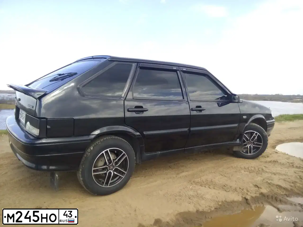 Фото автомобиля LADA 2114 SAMARA, 2010 — госномер М245НО43. Цвет: Сине-Черный