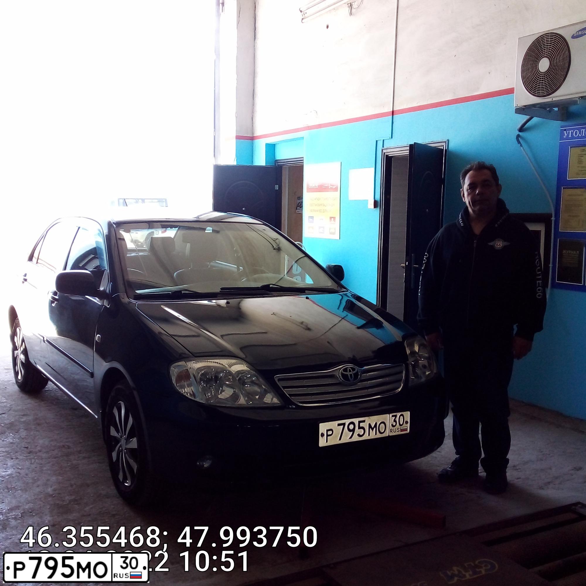 Фото автомобиля TOYOTA COROLLA, 2004 — госномер Р795МО30. Цвет: Темно-зеленый
