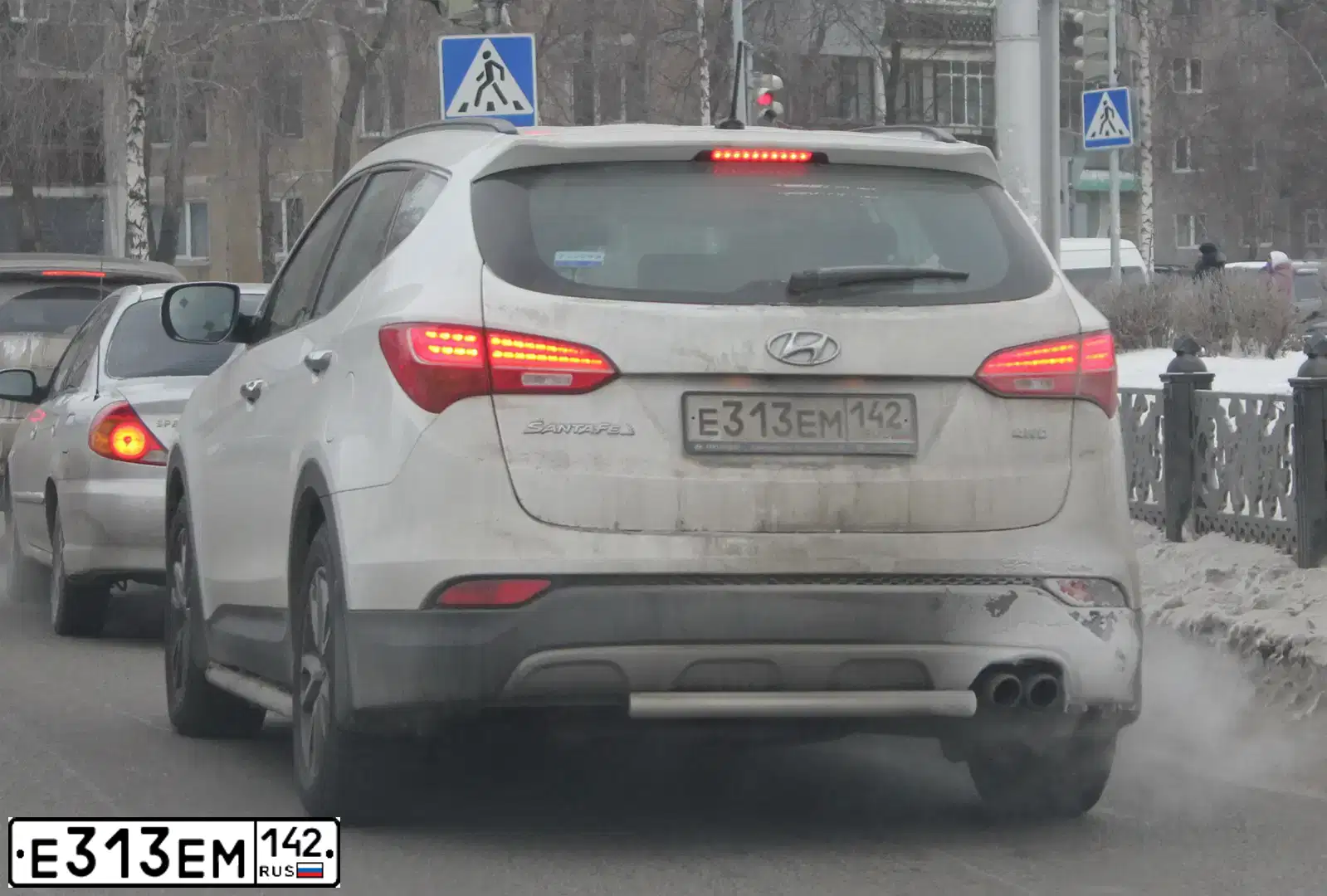 Фото автомобиля HYUNDAI SANTA FE, 2014 — госномер Е313ЕМ142. Цвет: БЕЛЫЙ
