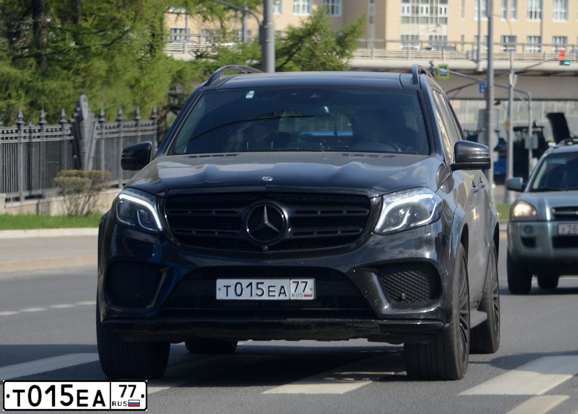 Фото автомобиля JEEP GRAND CHEROKEE, 2012 — госномер Т015ЕА77. Цвет: ЧЕРНЫЙ