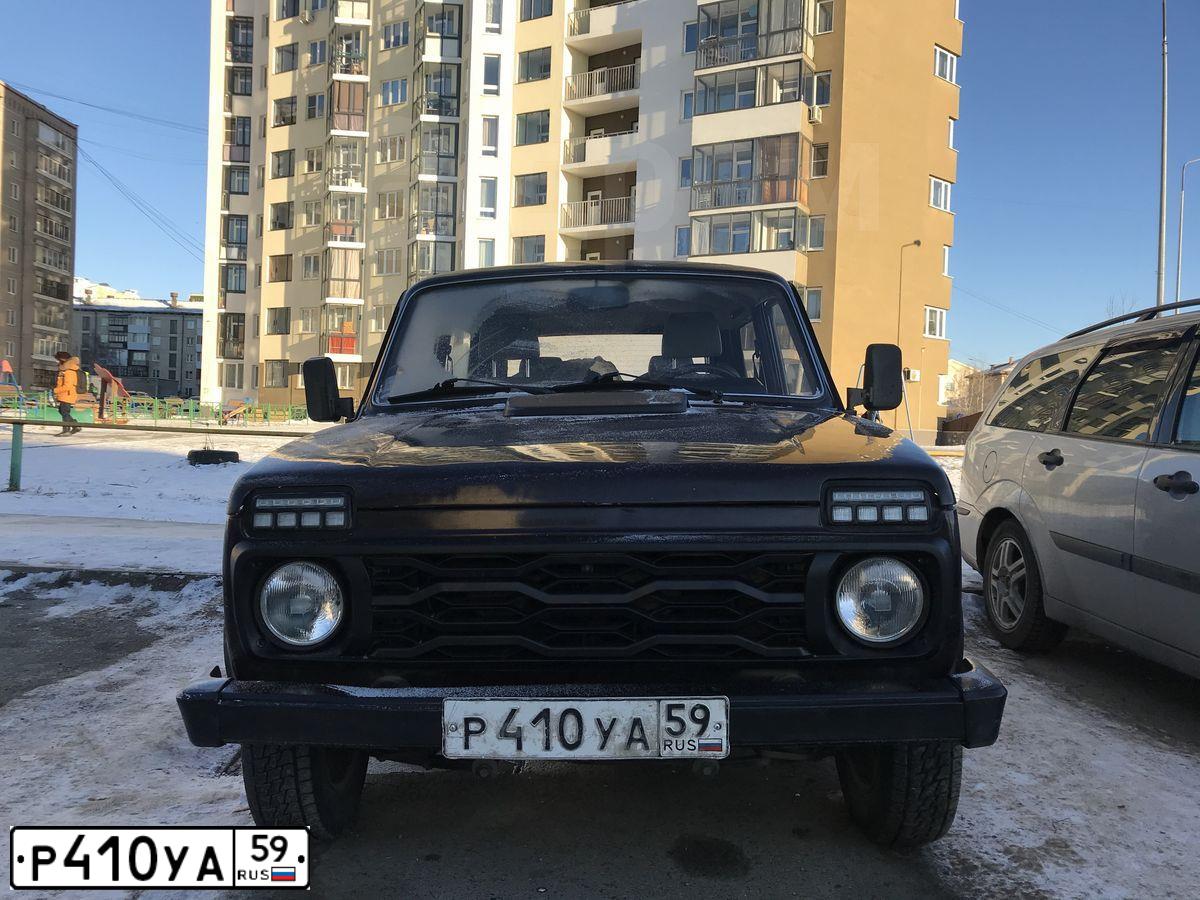 Фото автомобиля LADA 2121 NIVA, 2009 — госномер О415ВУ196. Цвет: ТЕМНО-КОРИЧНЕВЫЙ