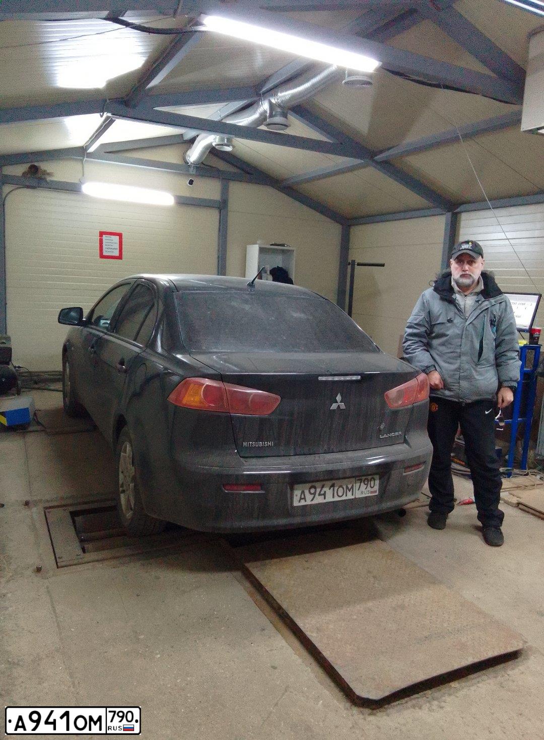 Фото автомобиля MITSUBISHI LANCER, 2007 — госномер К414РУ797. Цвет: ЧЕРНЫЙ