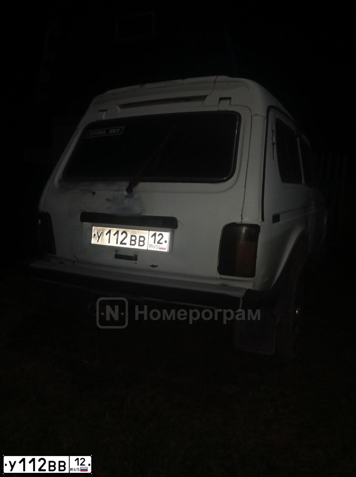 Фото автомобиля LADA 2121 NIVA, 1999 — госномер У112ВВ12. Цвет: БЕЛЫЙ