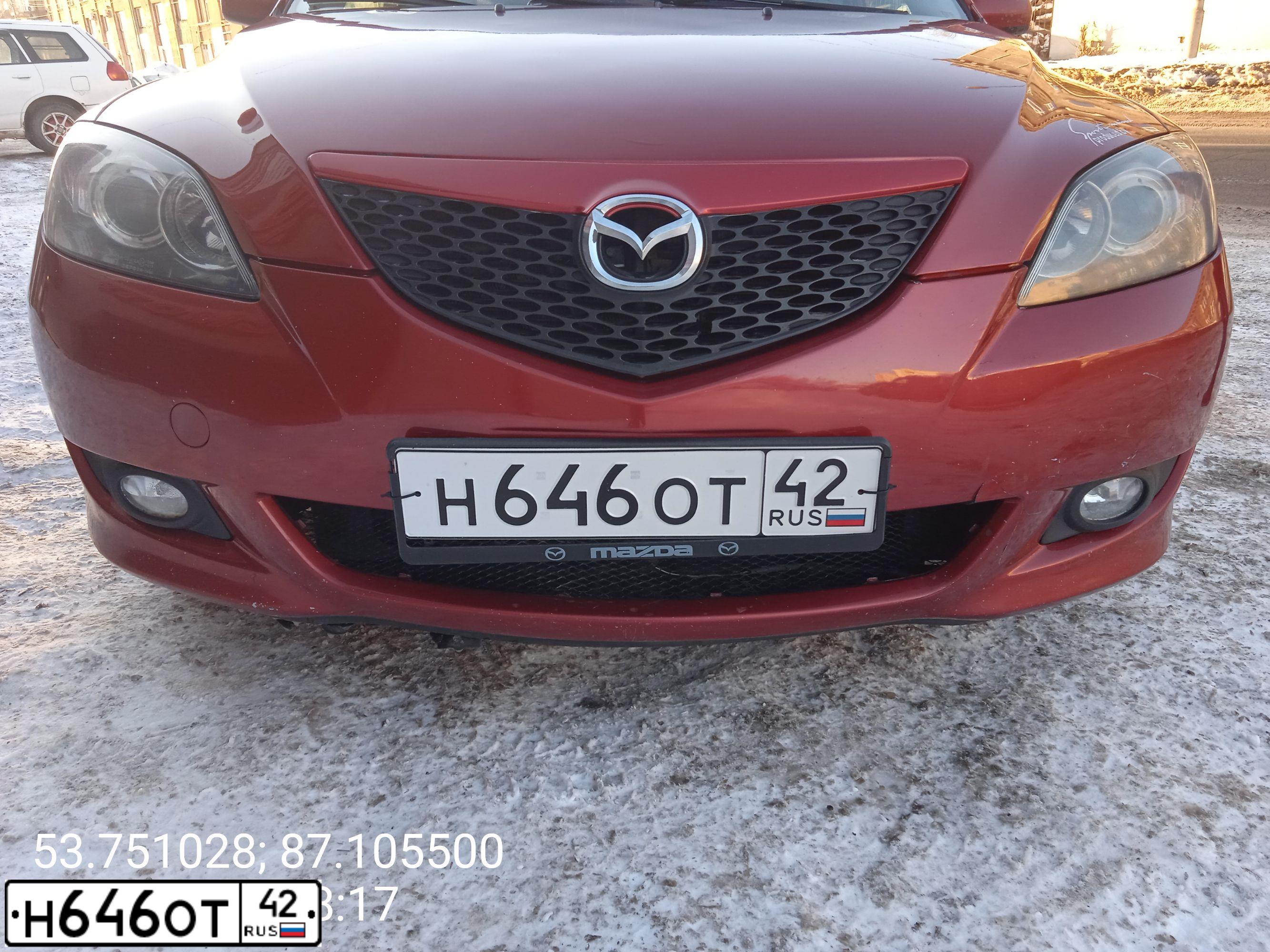 Фото автомобиля MAZDA 3, 2005 — госномер Т199ТТ64. Цвет: Красный