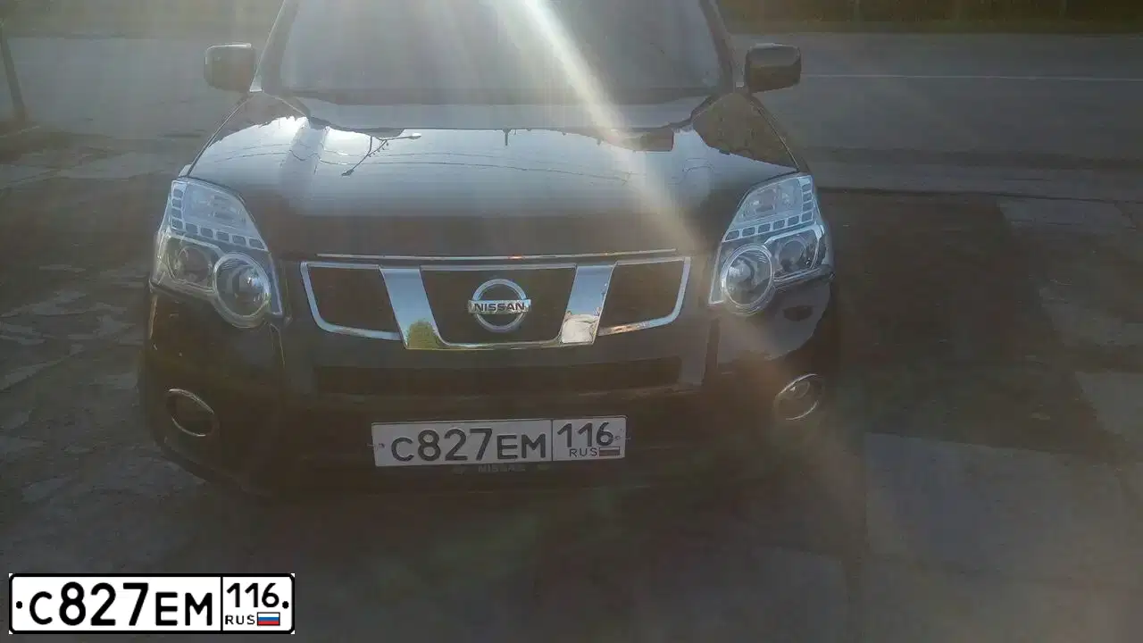 Фото автомобиля NISSAN X-TRAIL, 2012 — госномер Е232ТА21. Цвет: ЧЕРНЫЙ