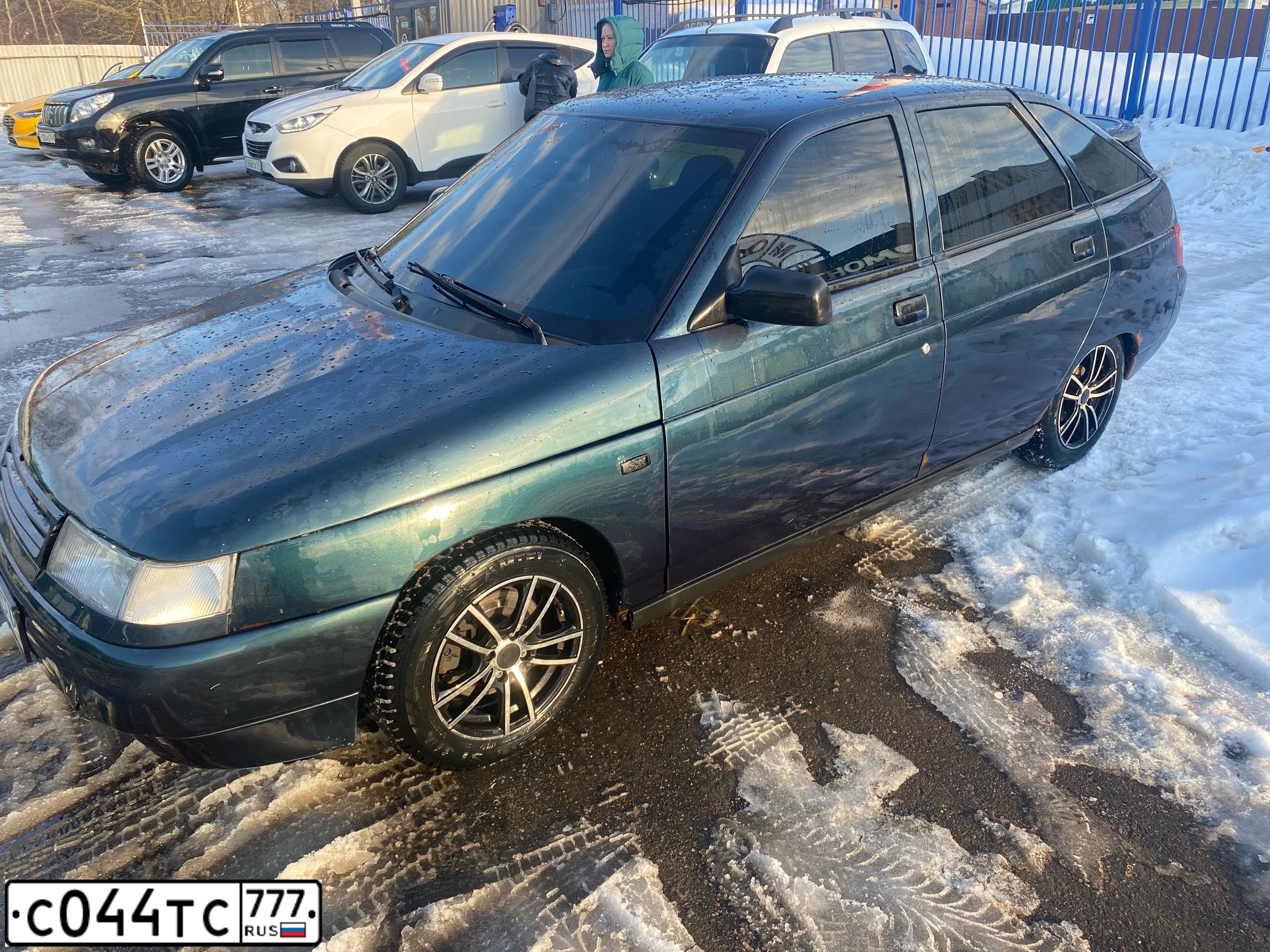 Фото автомобиля LADA 2112, 2006 — госномер С044ТС777. Цвет: ТЕМНО-ЗЕЛЕНЫЙ