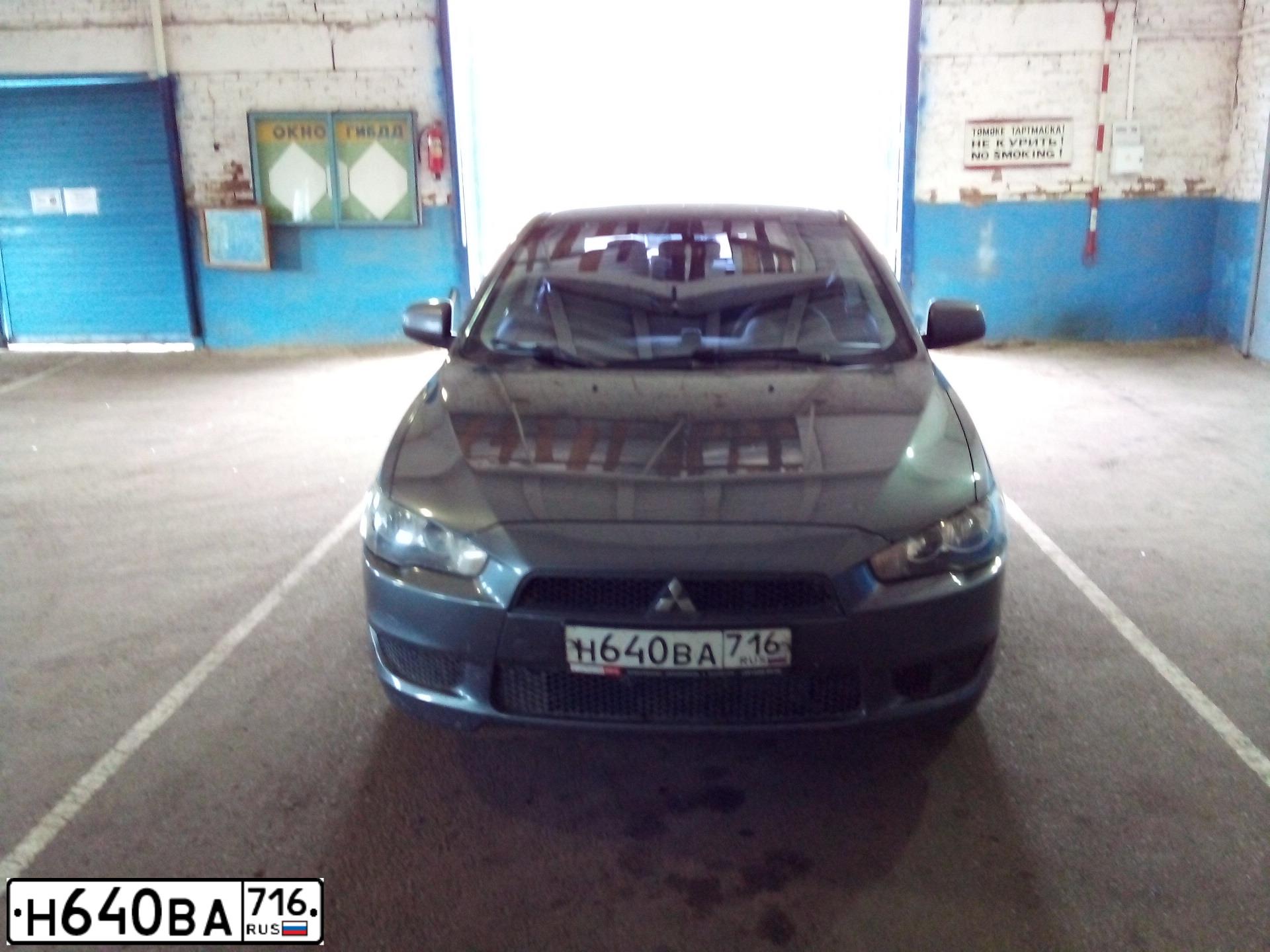 Фото автомобиля MITSUBISHI LANCER, 2008 — госномер Н640ВА716. Цвет: СЕРЫЙ