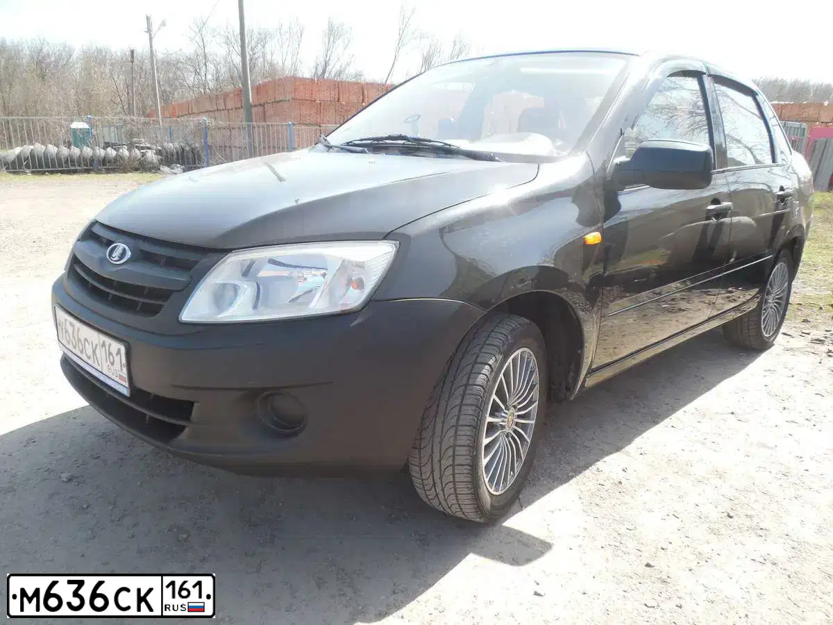 Фото автомобиля OPEL ASTRA, 2011 — госномер М636СК161. Цвет: ТЕМНО-СЕРЫЙ