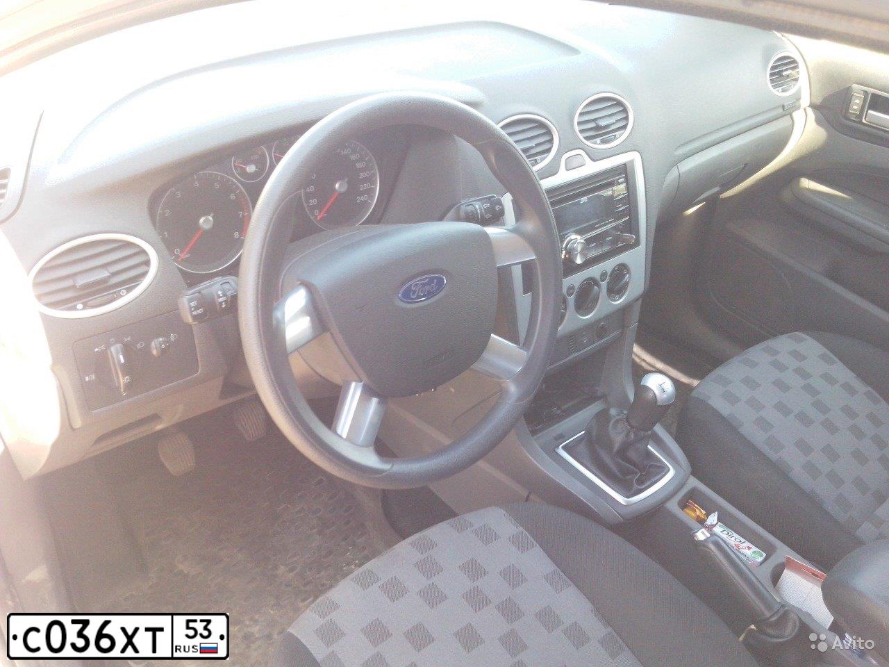 Фото автомобиля FORD FOCUS, 2007 — госномер Е901ТР53. Цвет: Серебристый