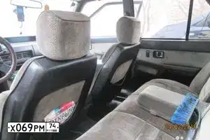 Фото автомобиля MAZDA 626, 1983 — госномер Х069РМ74. Цвет: Белый
