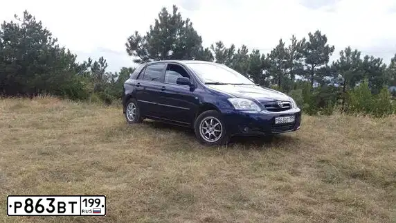 Фото автомобиля TOYOTA COROLLA, 2005 — госномер В464ВХ82. Цвет: СИНИЙ