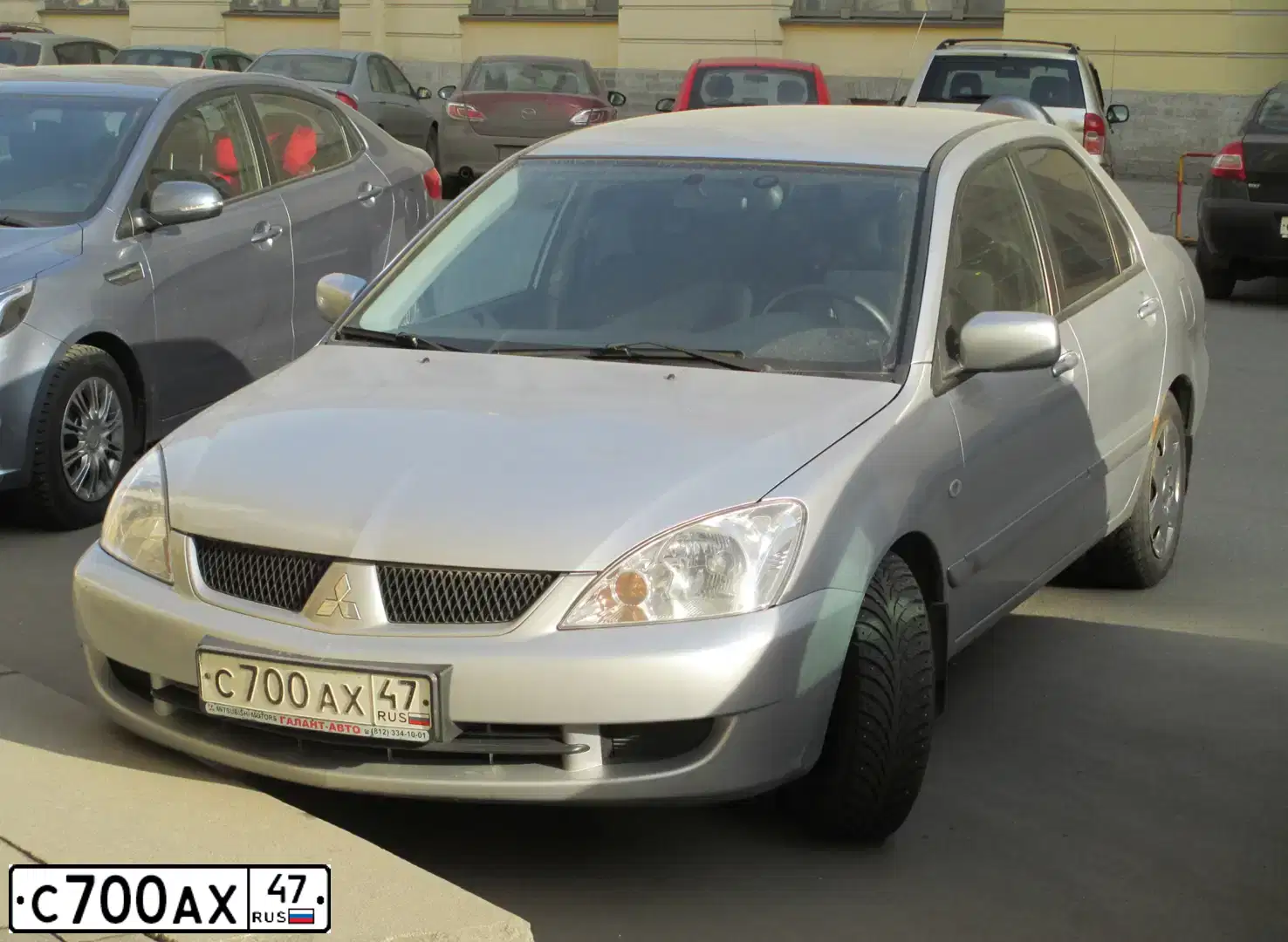 Фото автомобиля MITSUBISHI LANCER, 2007 — госномер С700АХ47. Цвет: СЕРЕБРИСТЫЙ