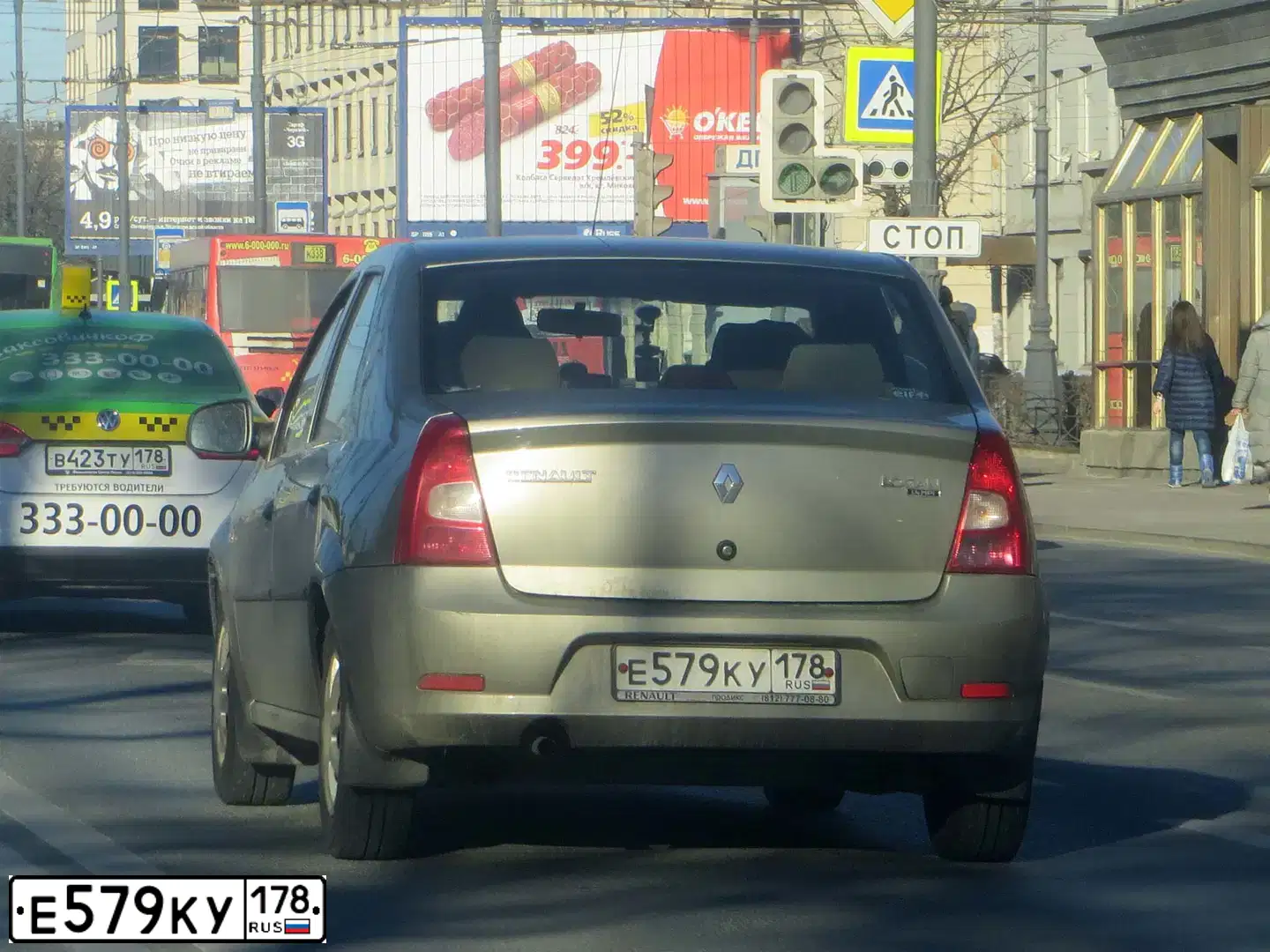 Фото автомобиля RENAULT LOGAN, 2011 — госномер Е579КУ178. Цвет: КОРИЧНЕВЫЙ