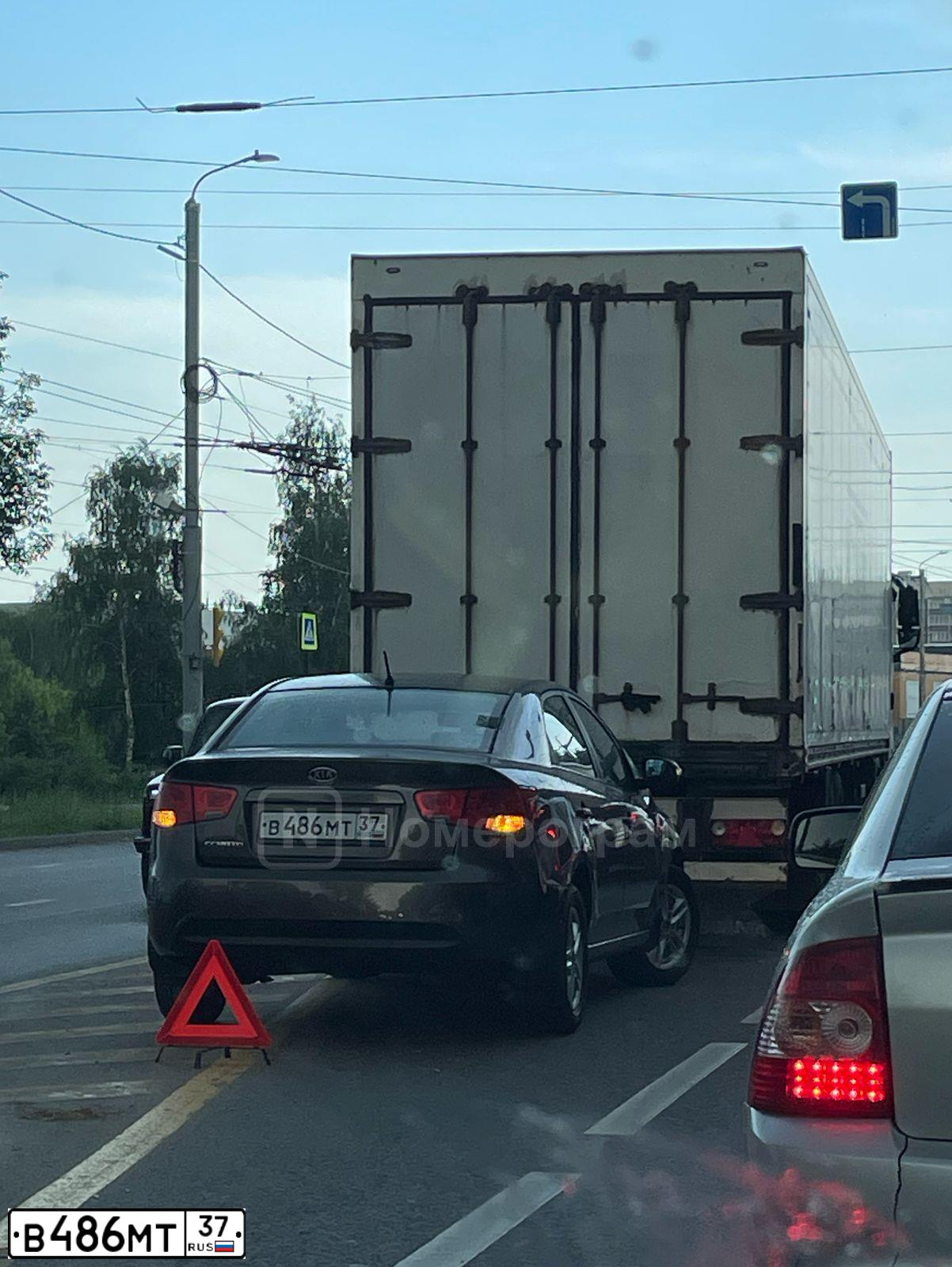 Фото автомобиля KIA CERATO, 2010 — госномер В486МТ37. Цвет: бронзовый