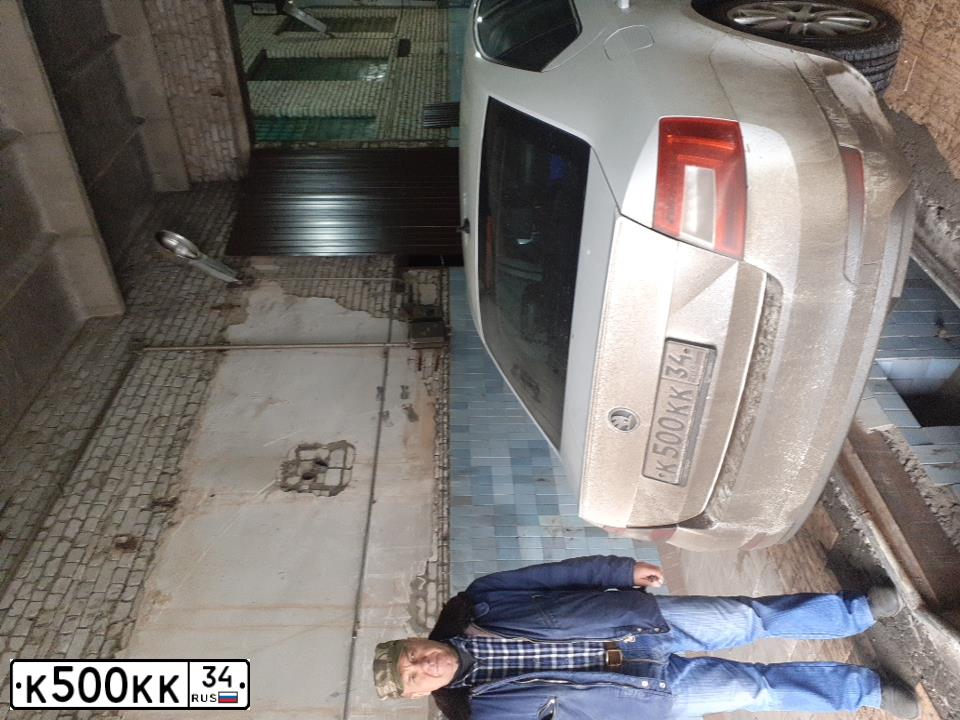 Фото автомобиля SKODA OCTAVIA, 2007 — госномер К500КК34. Цвет: Красный