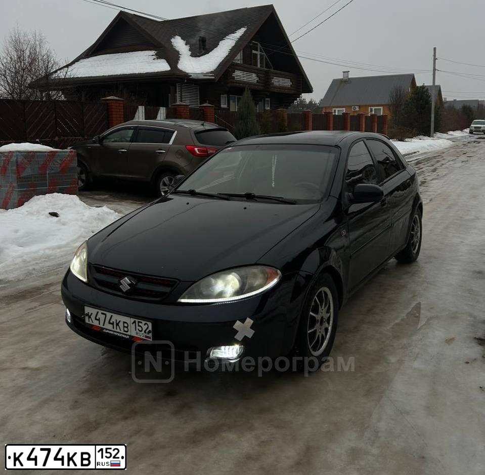 Фото автомобиля SUZUKI RENO, 2005 — госномер К474КВ152. Цвет: ЧЕРНЫЙ
