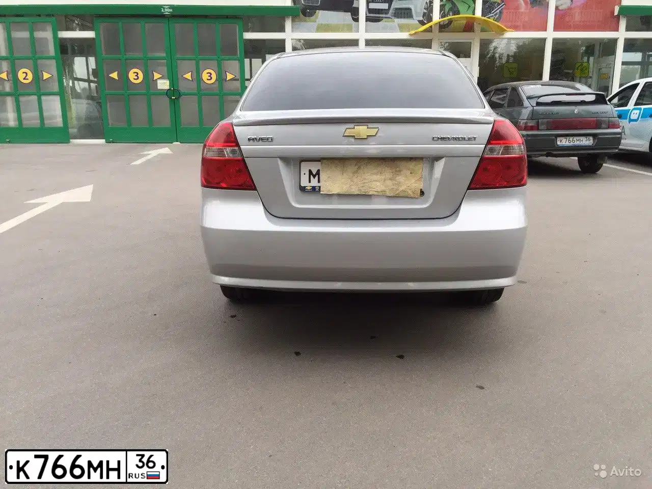 Фото автомобиля LADA 2112, 2006 — госномер К766МН36. Цвет: СЕРО-СИНЕ-ЗЕЛЕНЫЙ