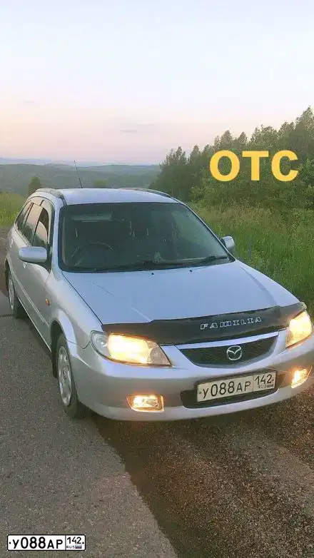 Фото автомобиля MAZDA FAMILIA, 2002 — госномер Х098НС142