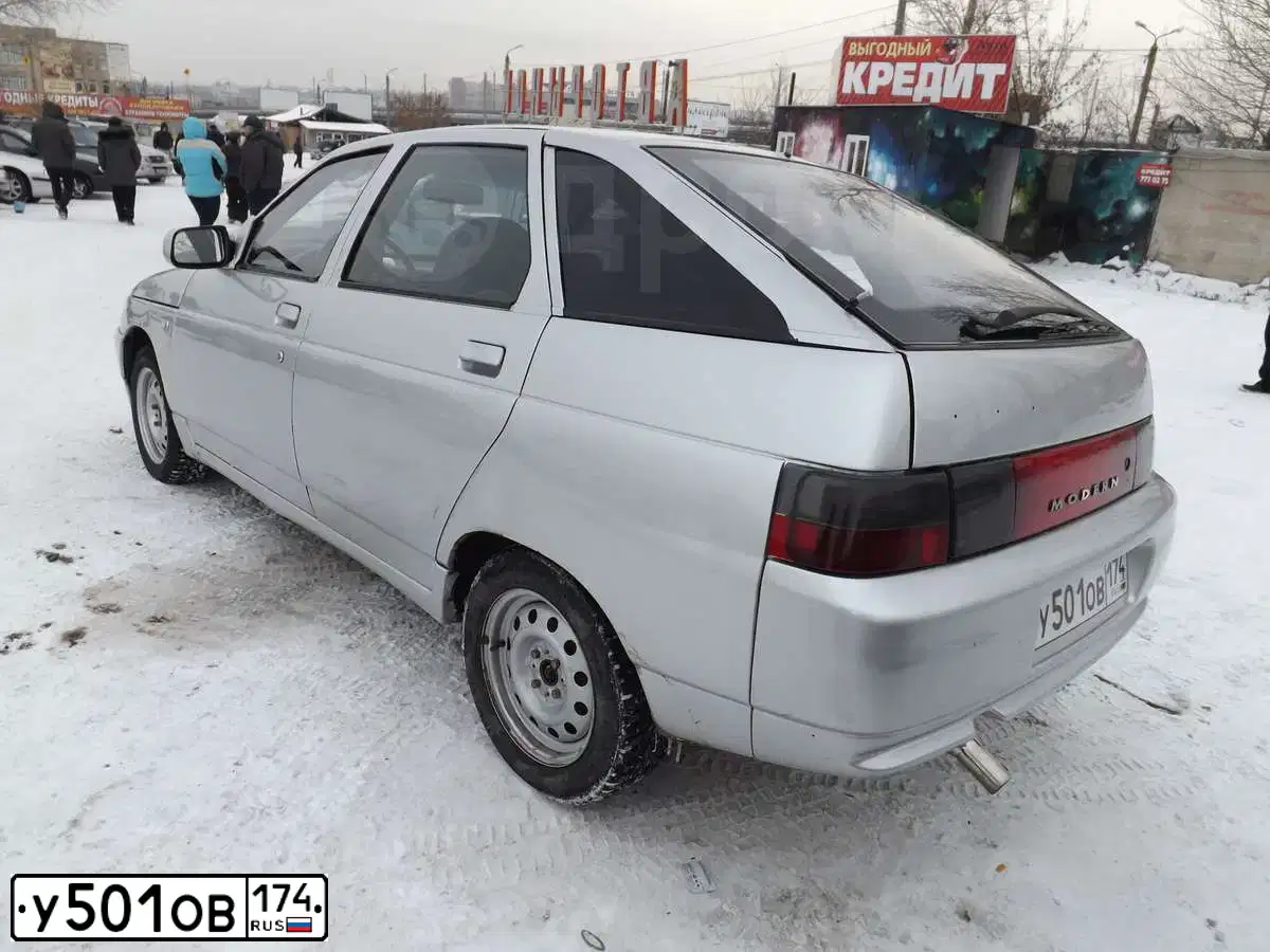 Фото автомобиля LADA 2112, 2003 — госномер У501ОВ174. Цвет: СВЕТЛО-СЕРЫЙ