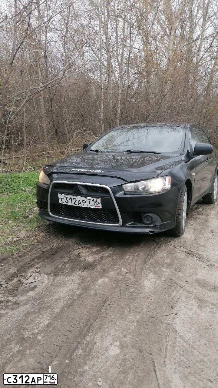 Фото автомобиля MITSUBISHI LANCER, 2013 — госномер С312АР716. Цвет: ЧЕРНЫЙ