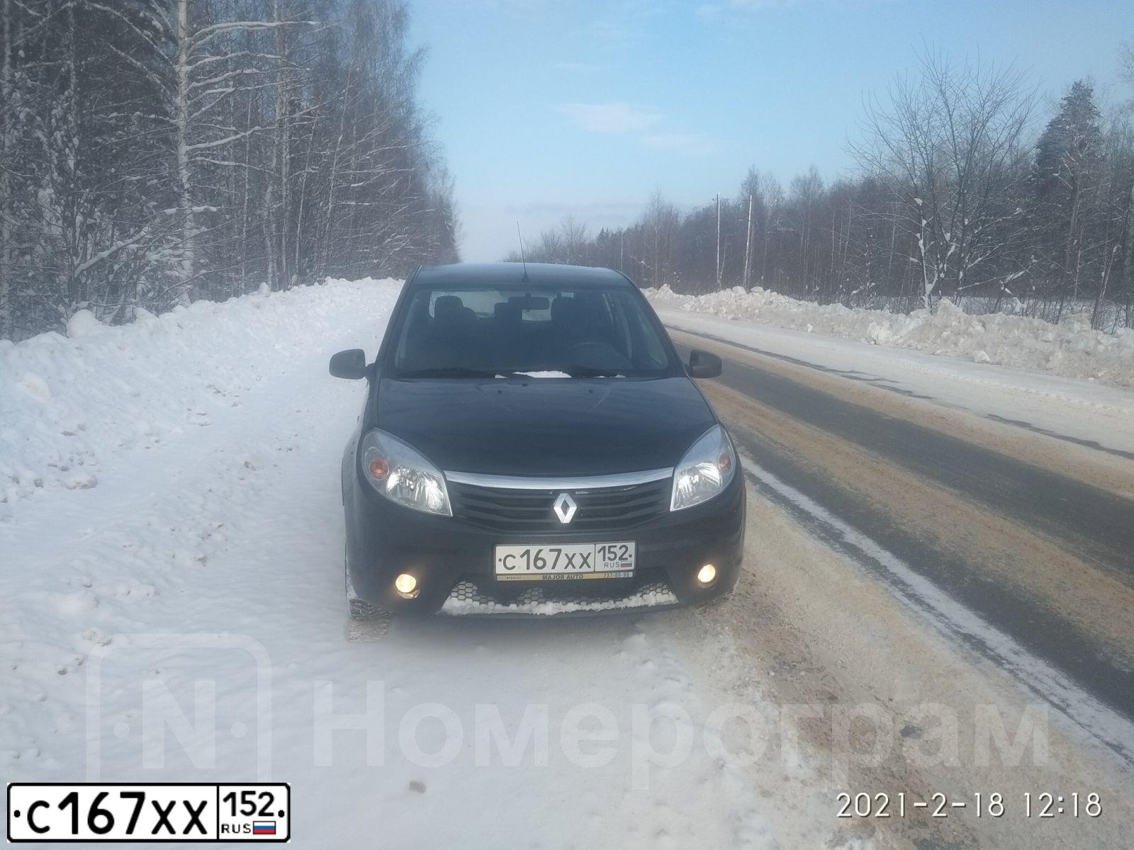 Фото автомобиля RENAULT SANDERO, 2010 — госномер А023МК190. Цвет: ЧЕРНЫЙ