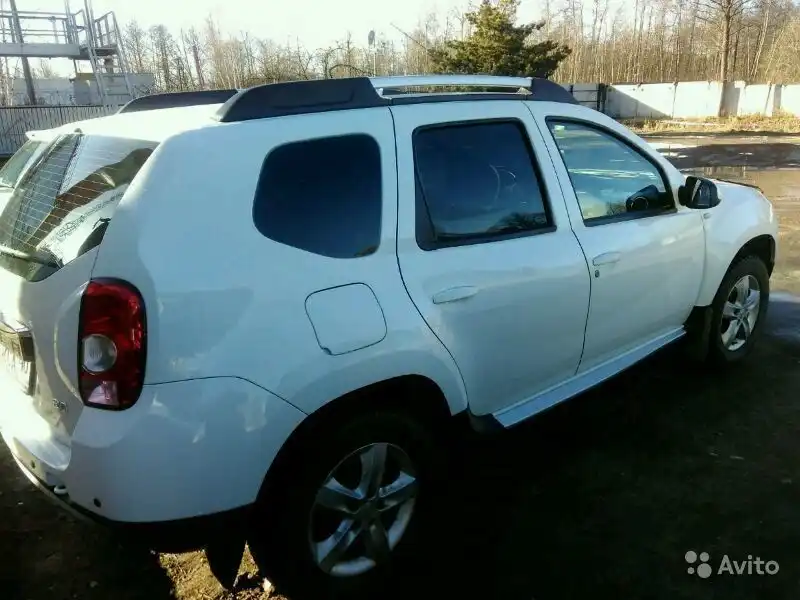 Фото автомобиля RENAULT DUSTER, 2013 — госномер О993ЕС40. Цвет: БЕЛЫЙ