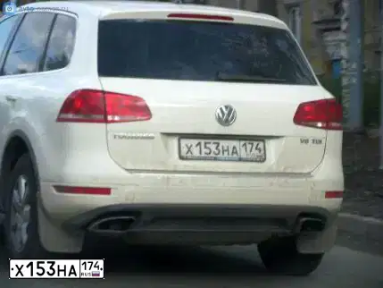 Фото автомобиля VOLKSWAGEN TOUAREG, 2010 — госномер Х153НА174. Цвет: БЕЛЫЙ