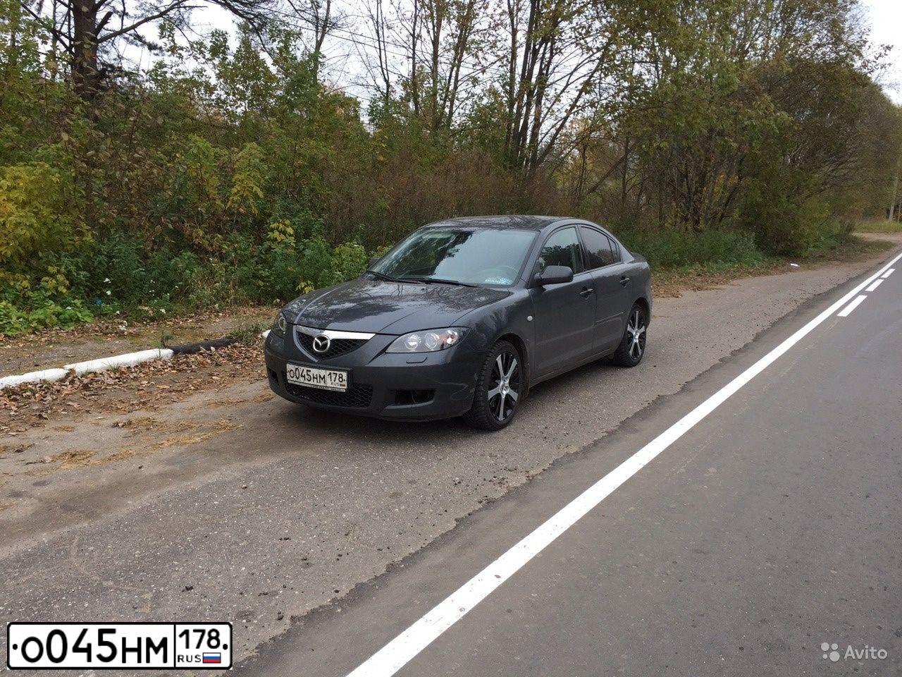 Фото автомобиля MAZDA 3, 2007 — госномер Е128ТО69. Цвет: ТЕМНО-СЕРЫЙ