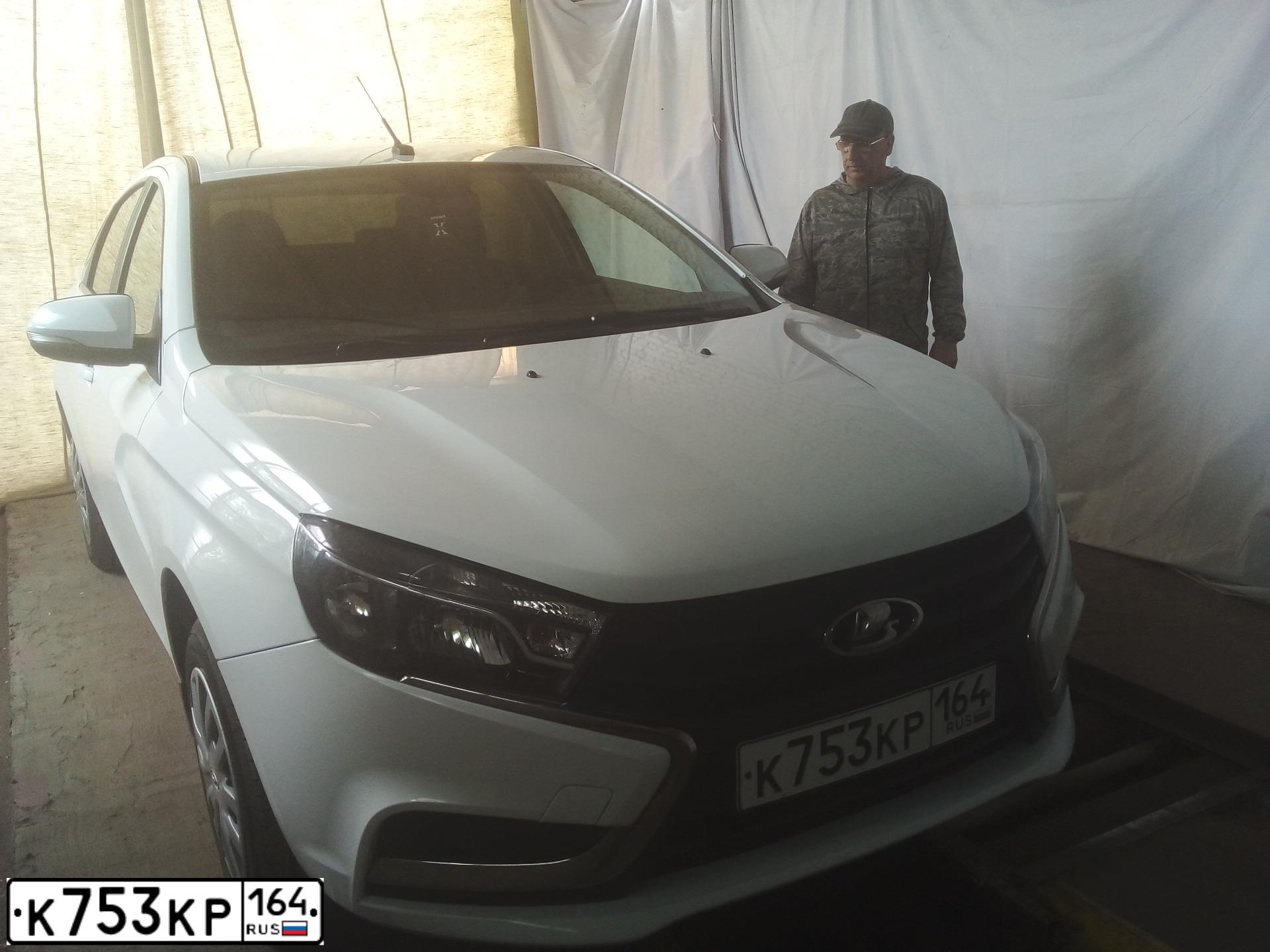 Фото автомобиля LADA VESTA, 2019 — госномер Х384НО136. Цвет: Белый