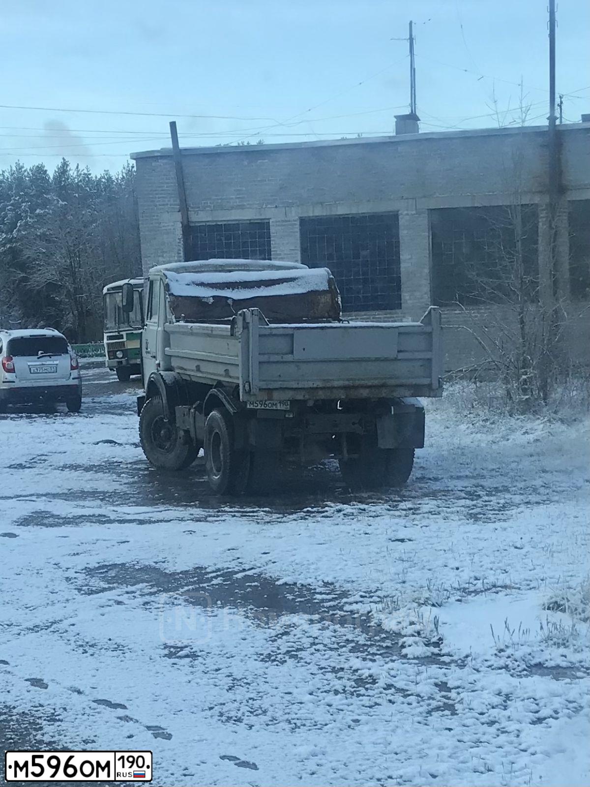 Фото автомобиля NISSAN NAVARA, 2007 — госномер Р214КС150. Цвет: ЧЕРНЫЙ