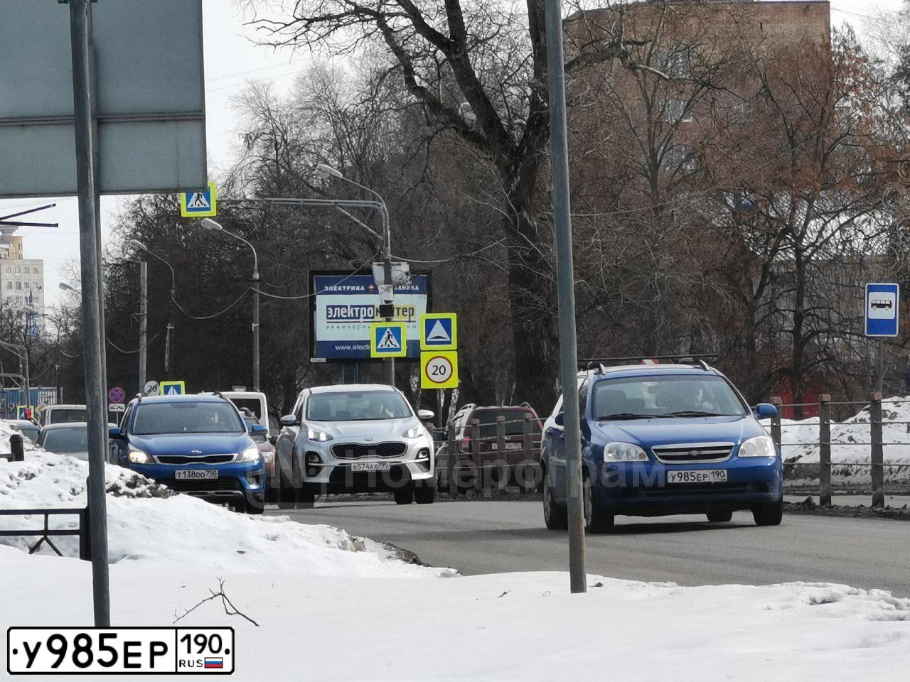 Фото автомобиля CHEVROLET LACETTI, 2009 — госномер У985ЕР190. Цвет: СИНИЙ