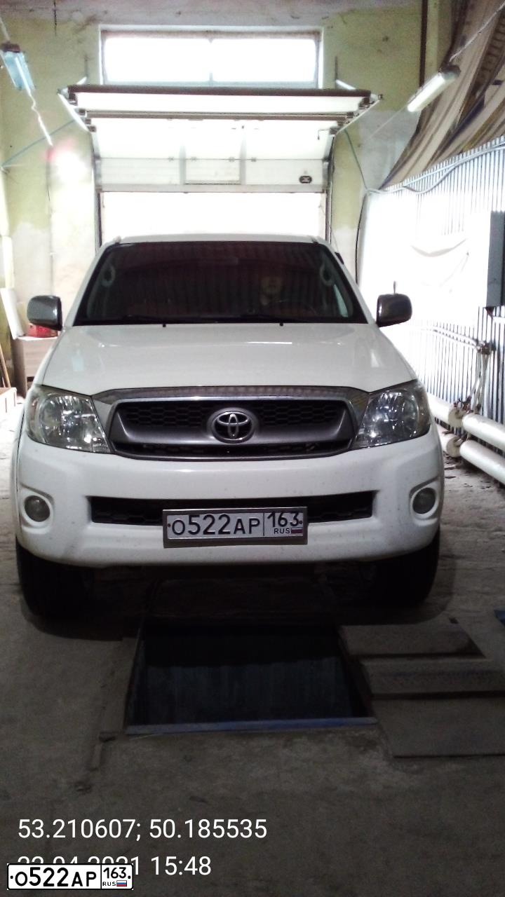 Фото автомобиля TOYOTA HILUX, 2011 — госномер О522АР163. Цвет: Белый