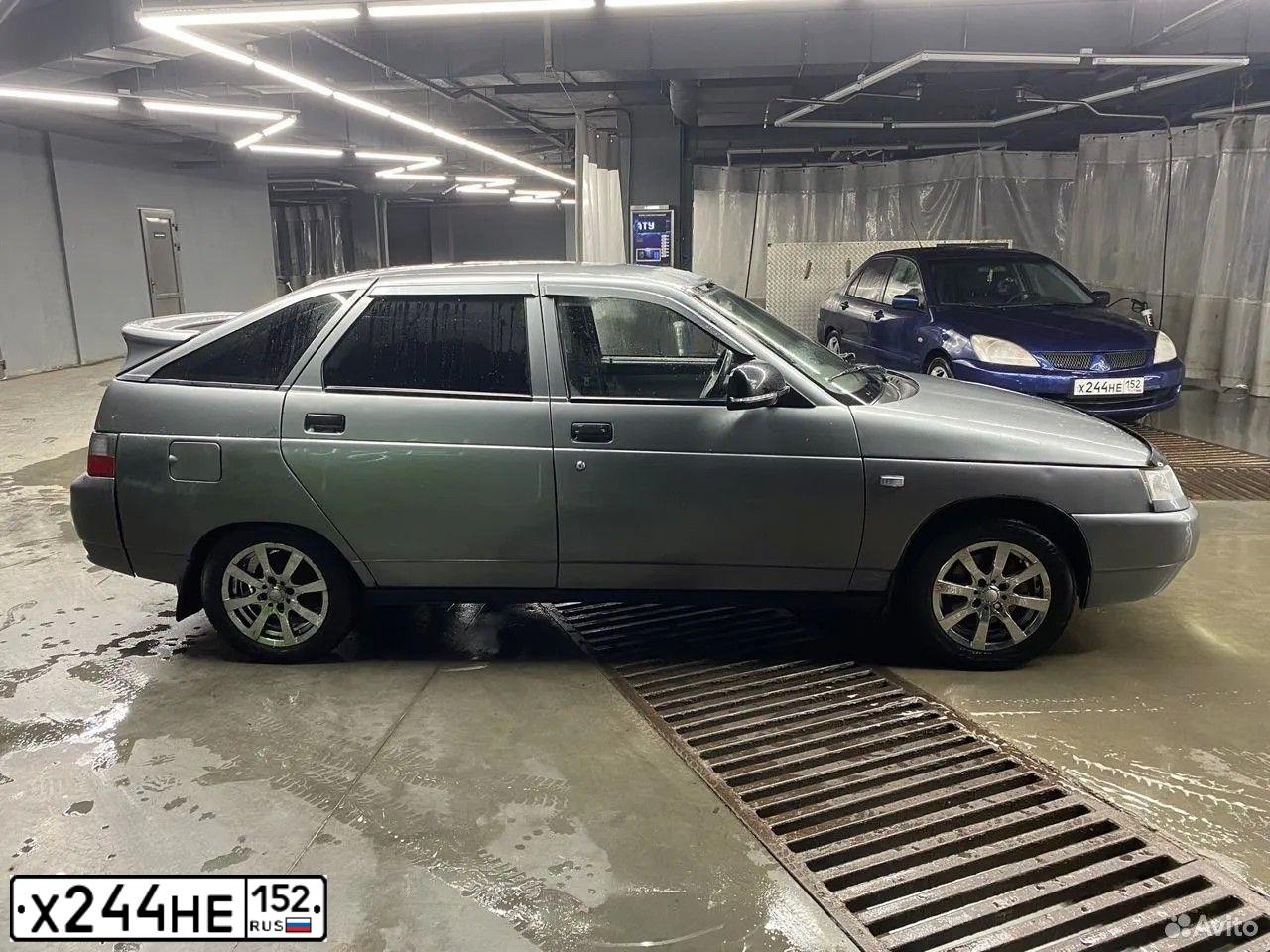 Фото автомобиля MITSUBISHI LANCER, 2006 — госномер Т697КХ177. Цвет: синий