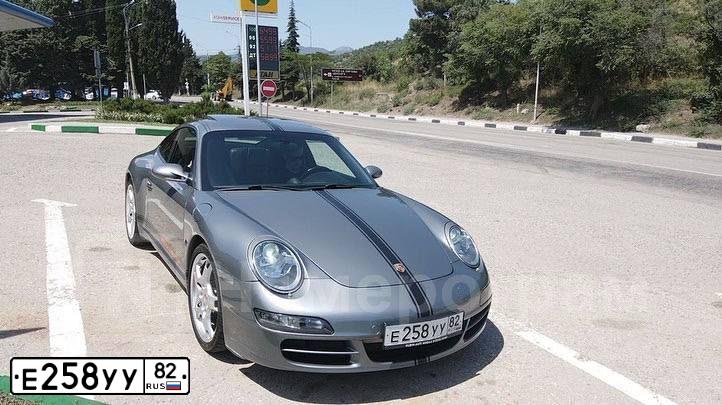 Фото автомобиля PORSCHE E 911, 2005 — госномер Е258УУ82. Цвет: Серый