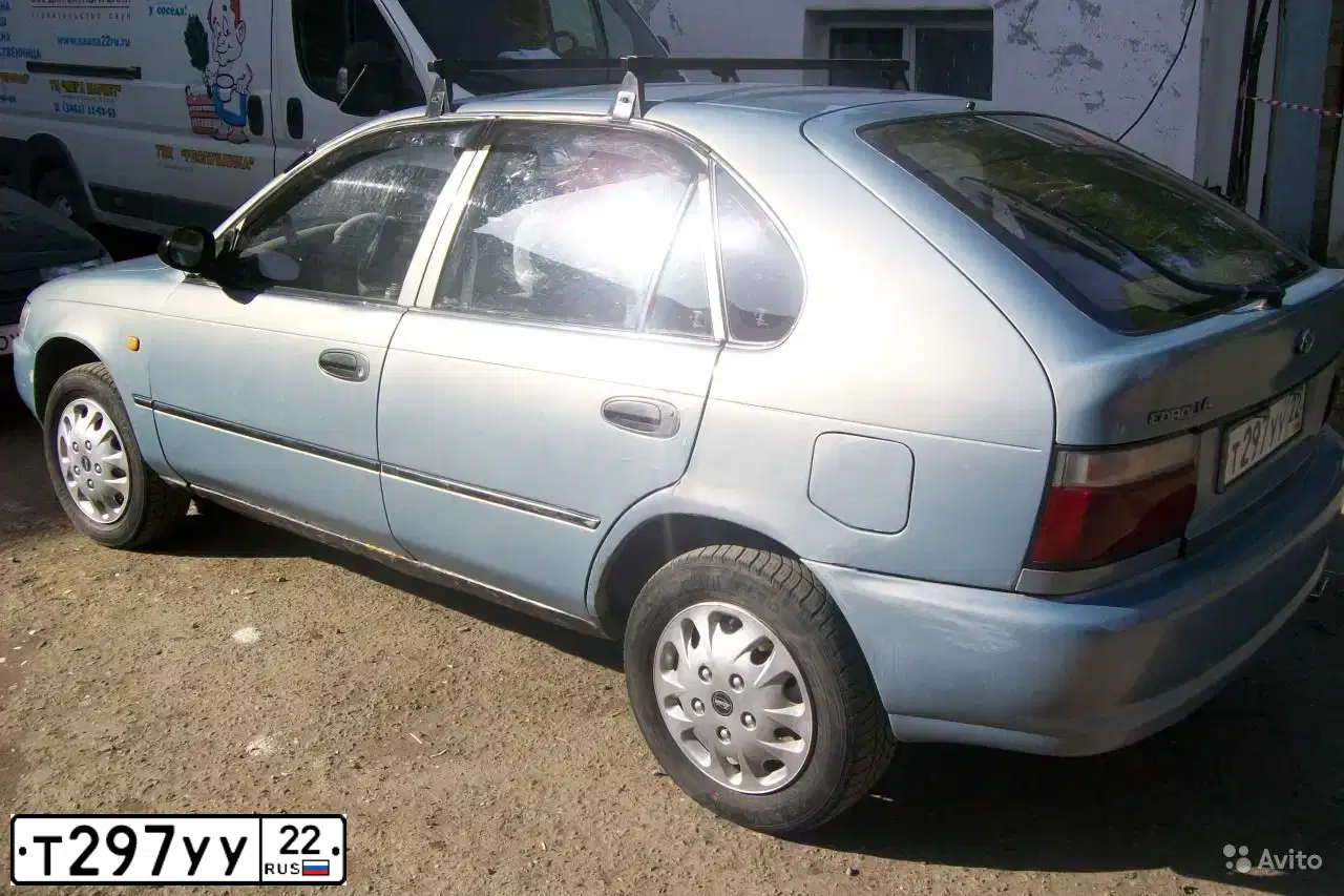 Фото автомобиля TOYOTA COROLLA, 1992 — госномер О257ОН77. Цвет: СЕРО-ЗЕЛЕНЫЙ