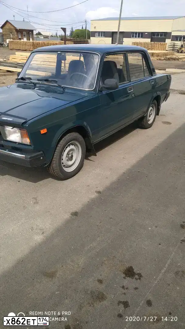 Фото автомобиля LADA 2107 LADA, 2007 — госномер Х862ЕТ174. Цвет: Темно-зеленый