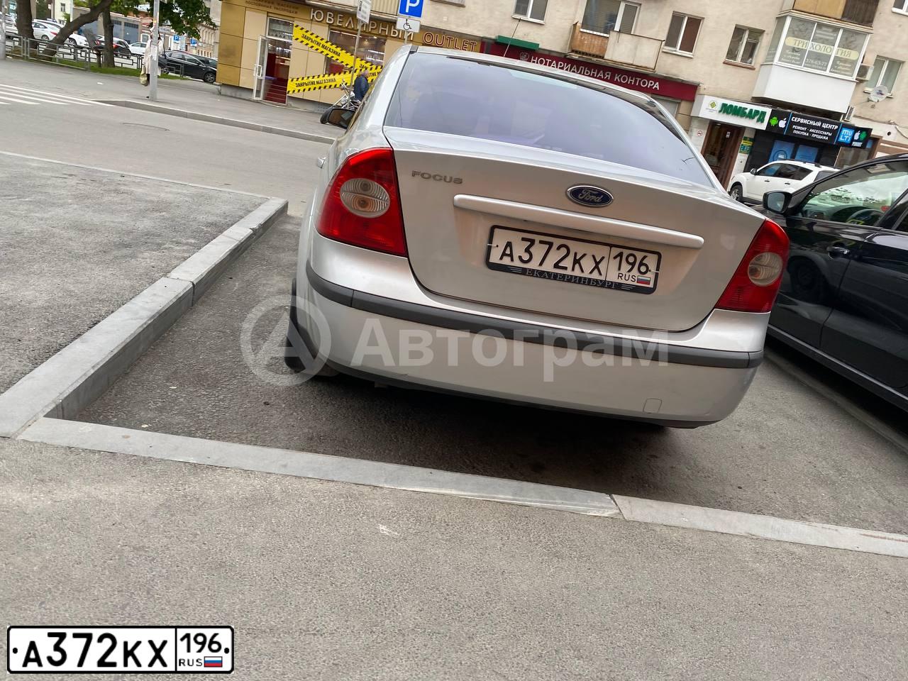 Фото автомобиля FORD D FOCUS, 2005 — госномер Х843АЕ177. Цвет: СВЕТЛО-СЕРЫЙ