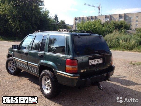 Фото автомобиля JEEP GRAND CHEROKEE, 1993 — госномер В100КР97. Цвет: ЗЕЛЕНЫЙ ТЕМНЫЙ