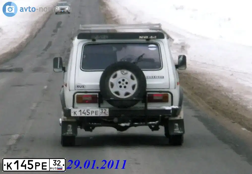 Фото автомобиля LADA 2121 NIVA, 1989 — госномер К145РЕ32. Цвет: БЕЛЫЙ