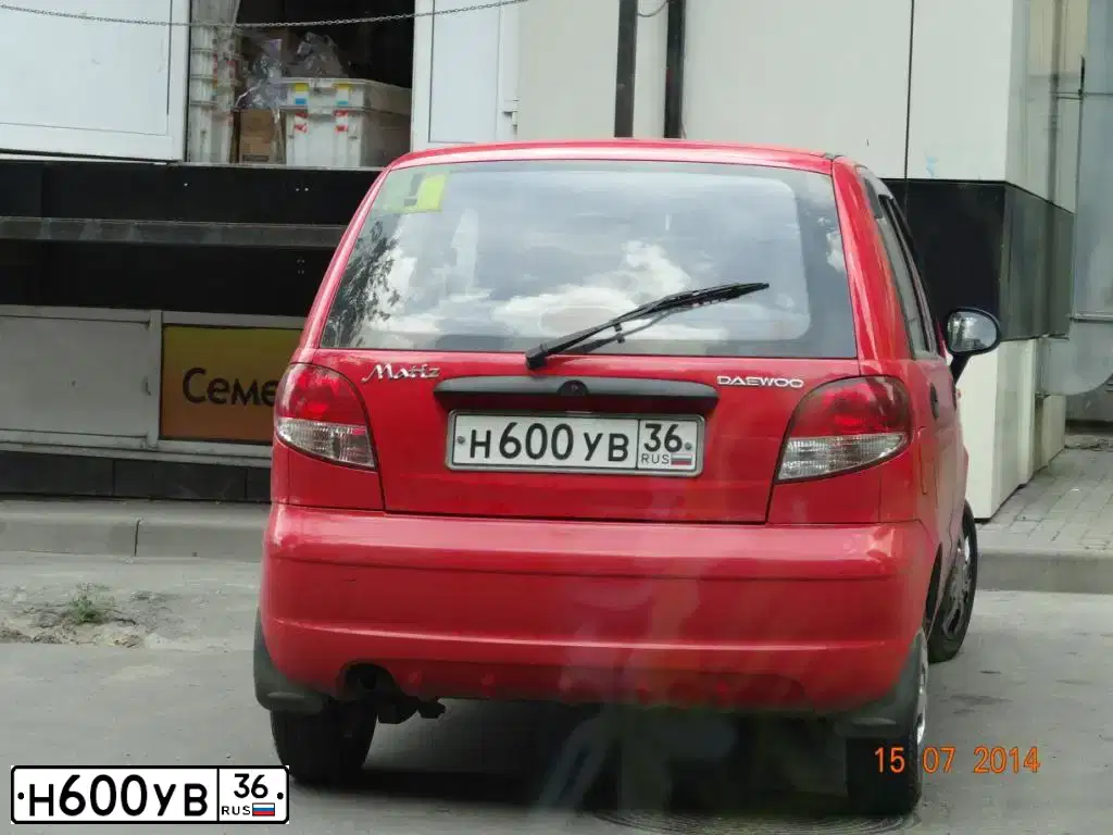 Фото автомобиля DAEWOO MATIZ, 2011 — госномер Р590АС48. Цвет: ЯРКО-КРАСНЫЙ