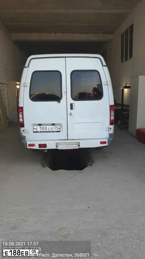 Фото автомобиля GAZ 3221 EL, 2006 — госномер Е188ЕВ05. Цвет: Белый