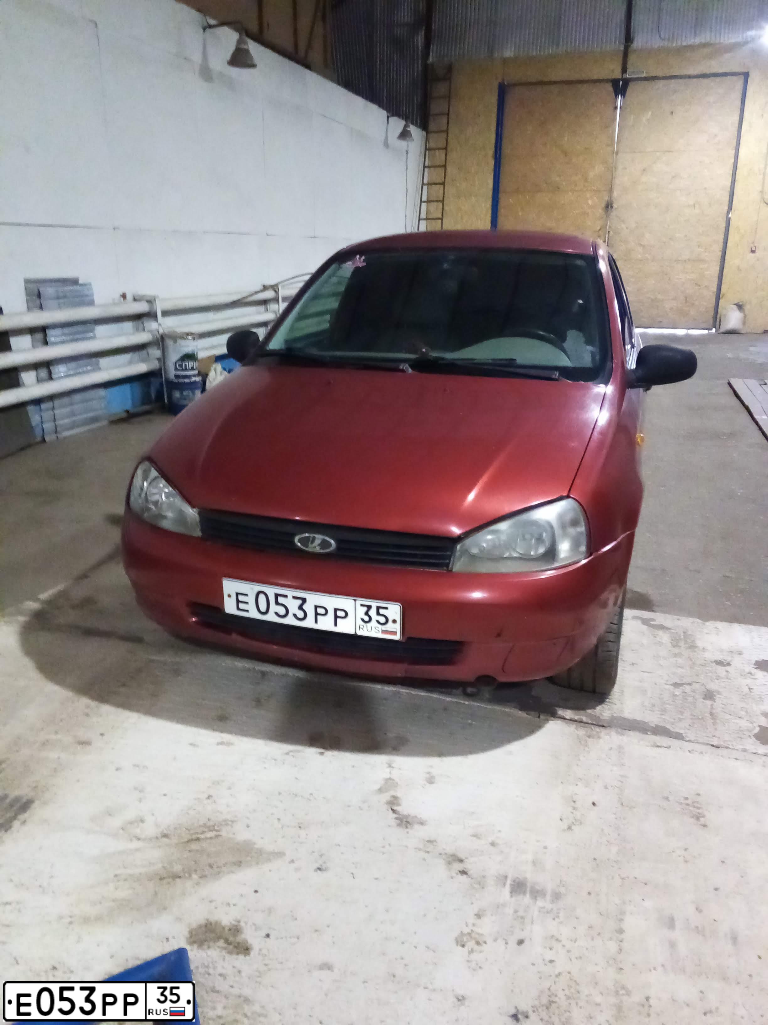 Фото автомобиля LADA 1119 KALINA, 2007 — госномер Е053РР35. Цвет: СЕРЕБРИСТО-КРАСНЫЙ