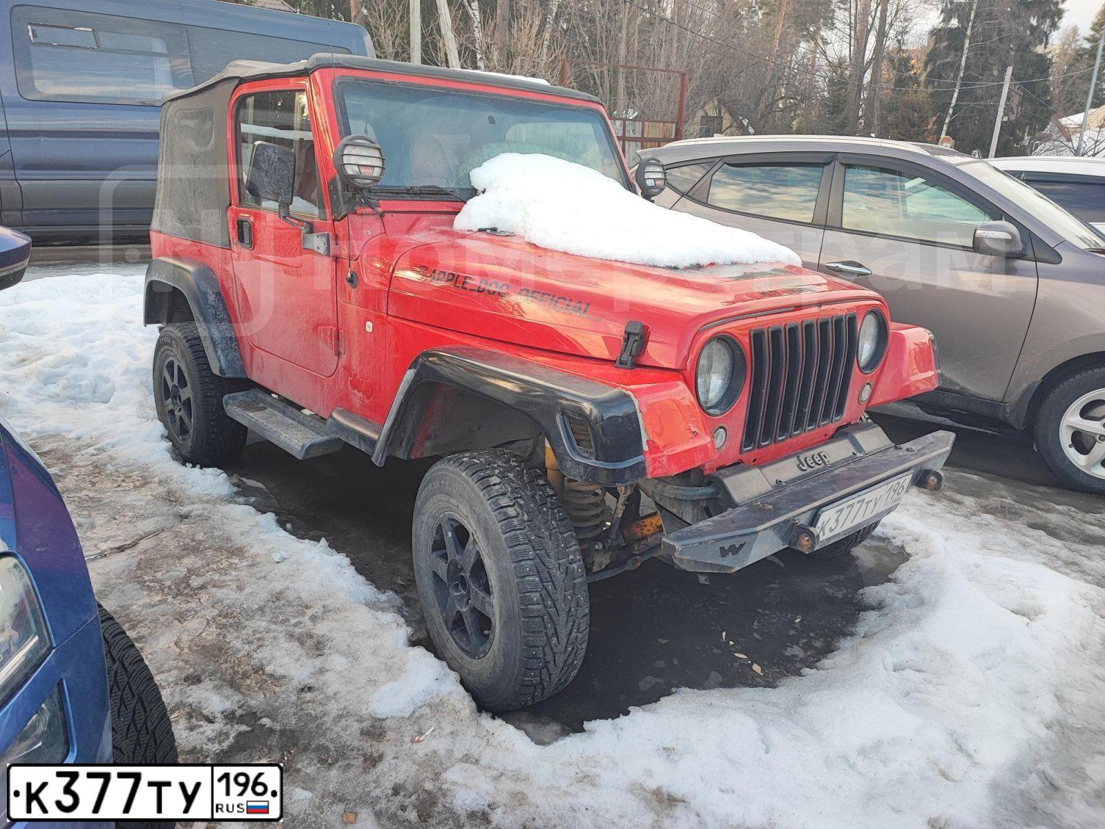 Фото автомобиля JEEP WRANGLER, 1999 — госномер Р900РС174. Цвет: Красный