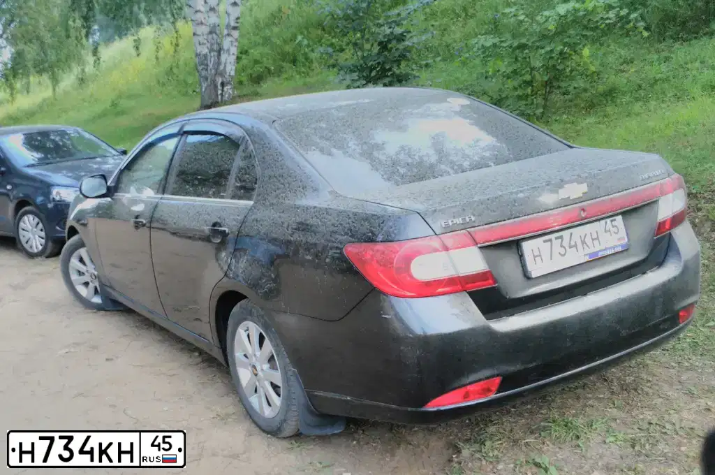 Фото автомобиля CHEVROLET EPICA, 2012 — госномер Н734КН45. Цвет: ЧЕРНЫЙ