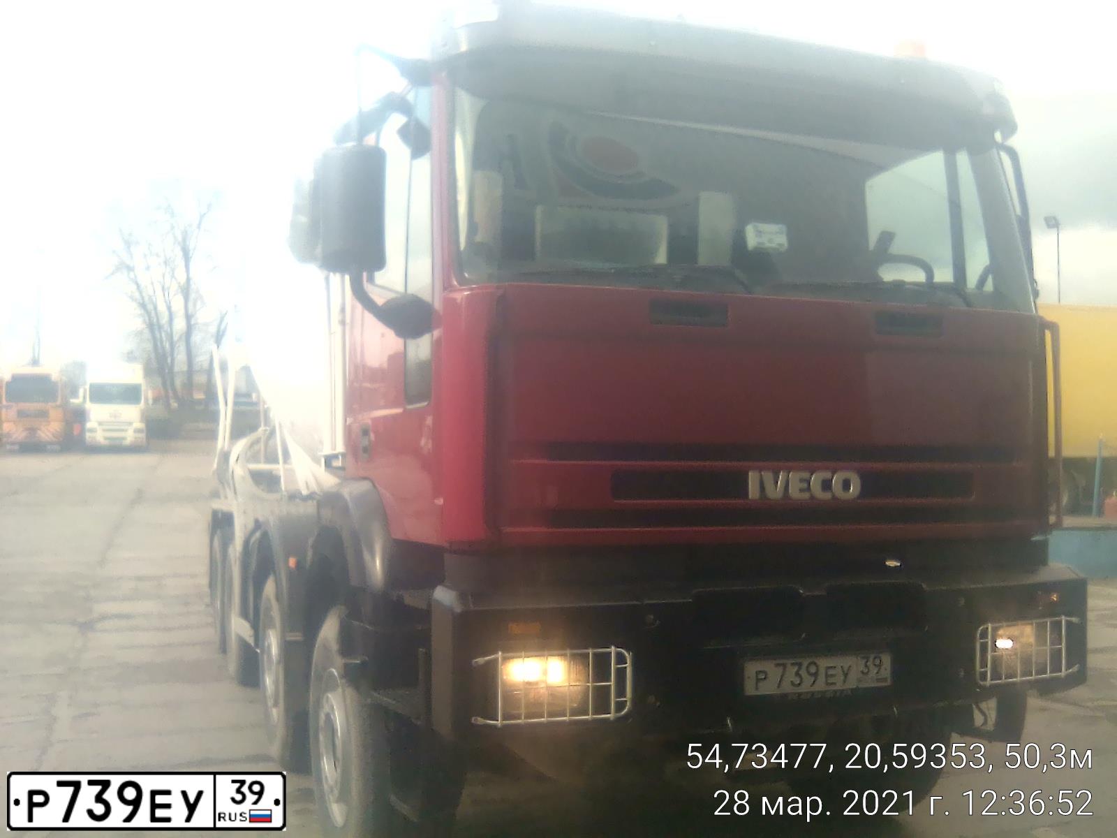 Фото автомобиля IVECO EUROTRAKKER/TRAKKER, 1999 — госномер С313ХТ39. Цвет: КРАСНЫЙ