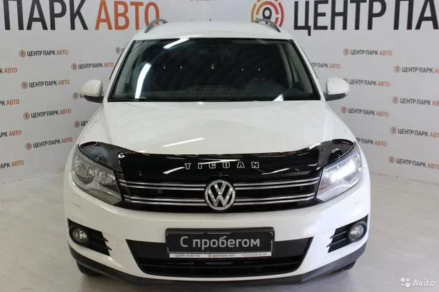 Фото автомобиля VOLKSWAGEN TIGUAN, 2014 — госномер Х791АР186. Цвет: Белый