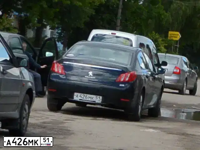 Фото автомобиля PEUGEOT 508, 2012 — госномер А426МК51. Цвет: ЧЕРНЫЙ
