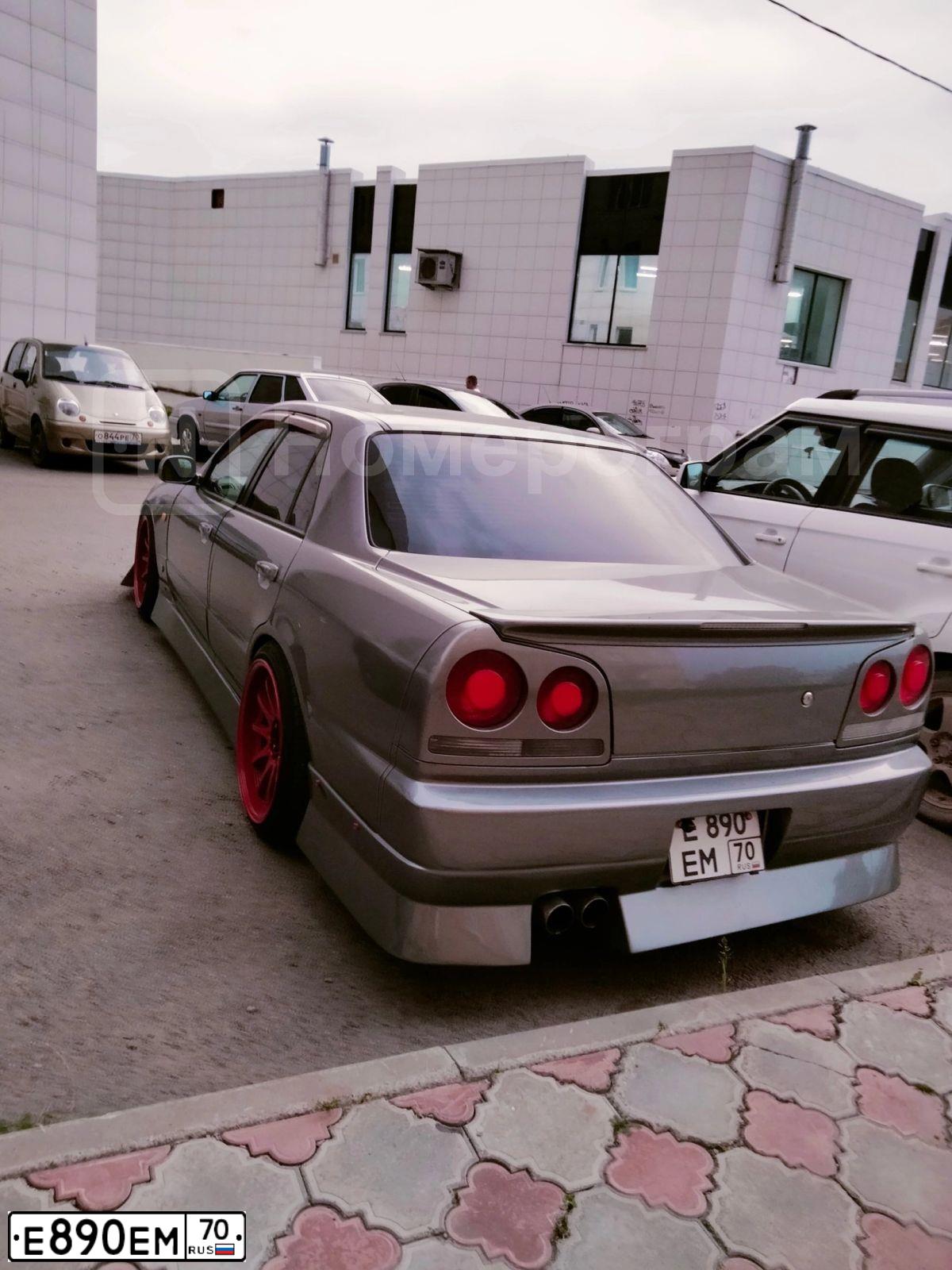 Фото автомобиля NISSAN SKYLINE, 2000 — госномер Е890ЕМ70